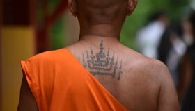 Tattoo on the back of Buddhist Monk in Thailand